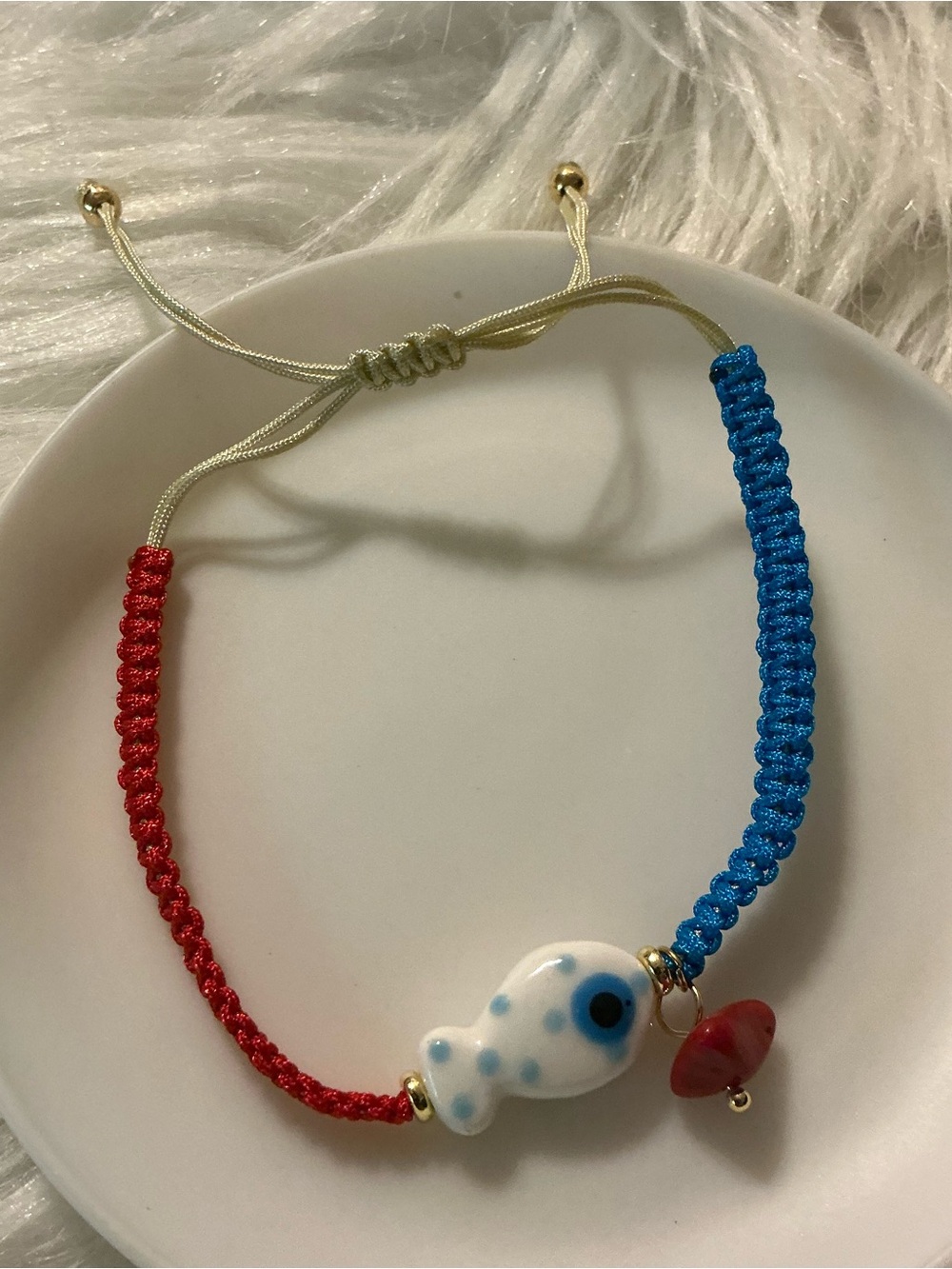 Red, white, blue bracelet with cute fish bead